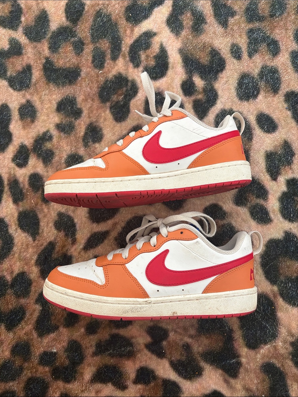 Orange and red nike dunks